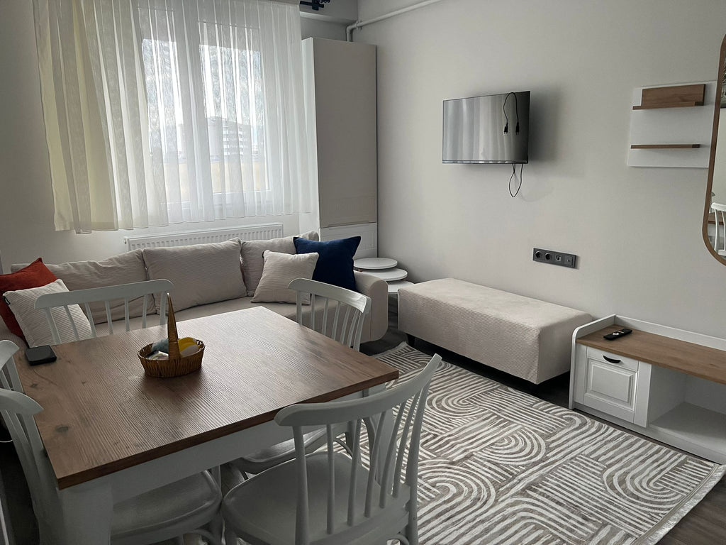 Dadaşkentte 4 yıllık bina Kiralık 1+1